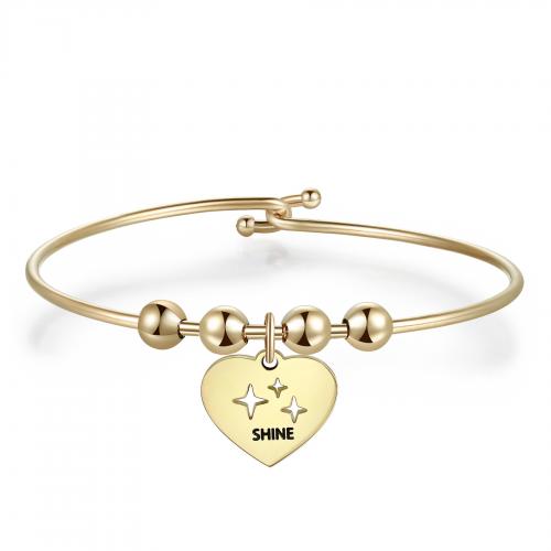 Bracciale rigido dorato serie Be My Always con cuore