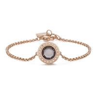 Bracciale dorato rosa serie Luna con cristallo azzurro