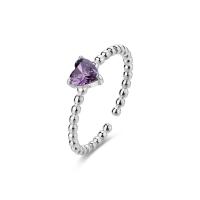 Anello dorato serie Dazzly con cristallo a cuore viola