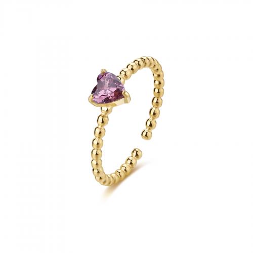 Anello dorato serie Dazzly con cristallo a cuore rosa